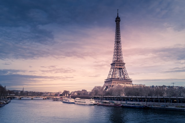 A river and city skyline at dusk